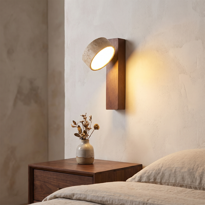 Travertine and Walnut Wall Sconce above a bedside table